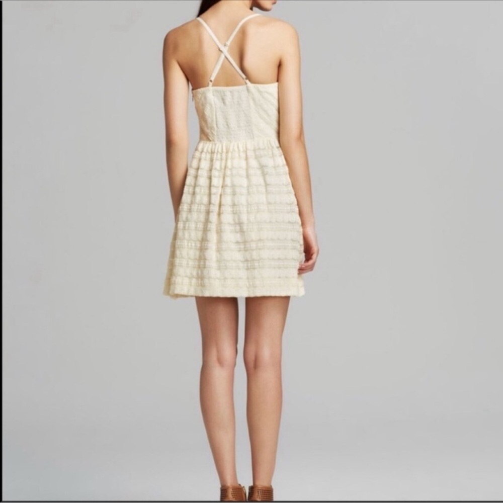 Guess lace corset dress 
In ivory color size 2